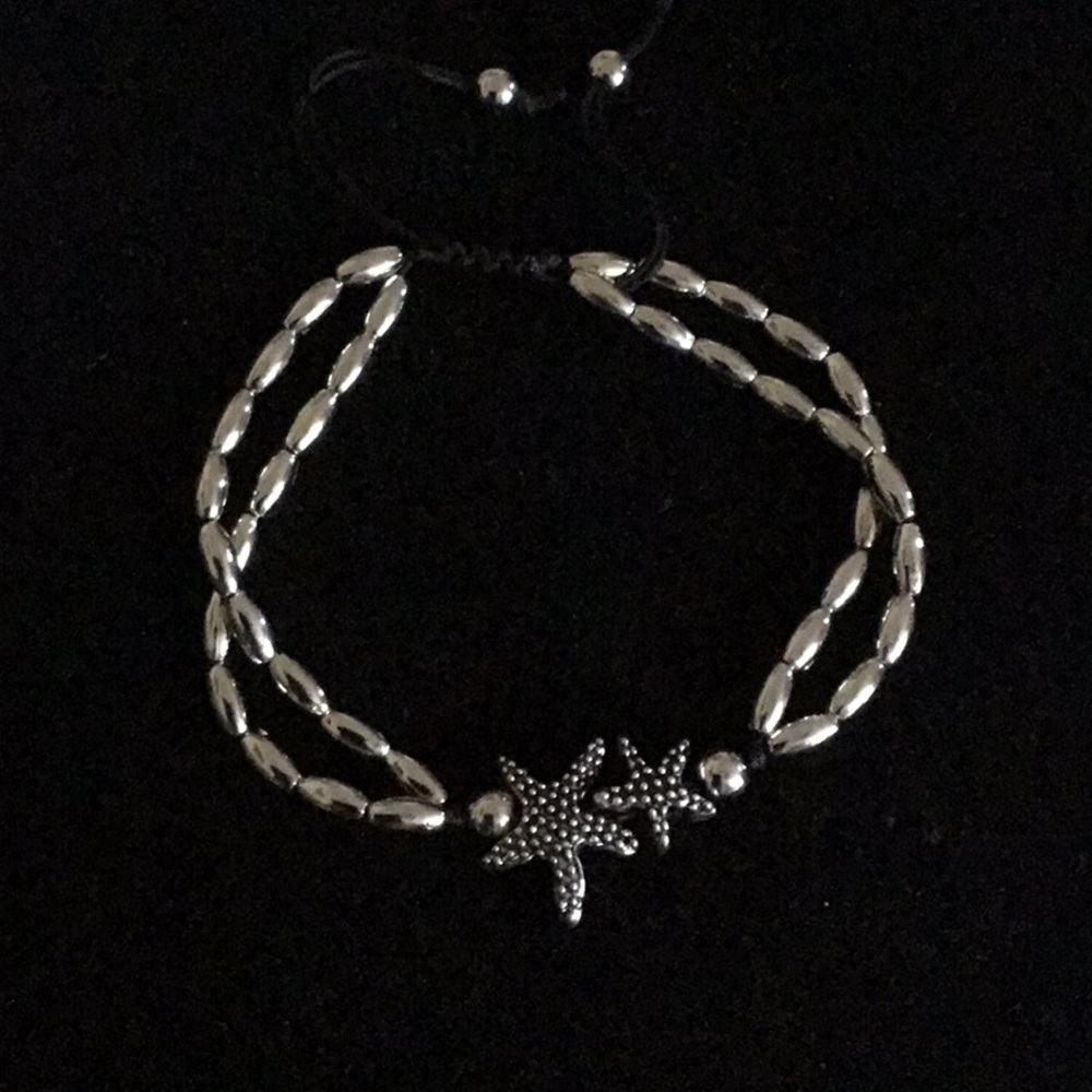 ANKLET SILVER TONE / BLACK STARFISH PULLSTRING
